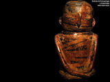 figura antropomorfa hueca con orificio superior para utilizar como recipiente de ofrendas (region Quimbaya de Colombia)